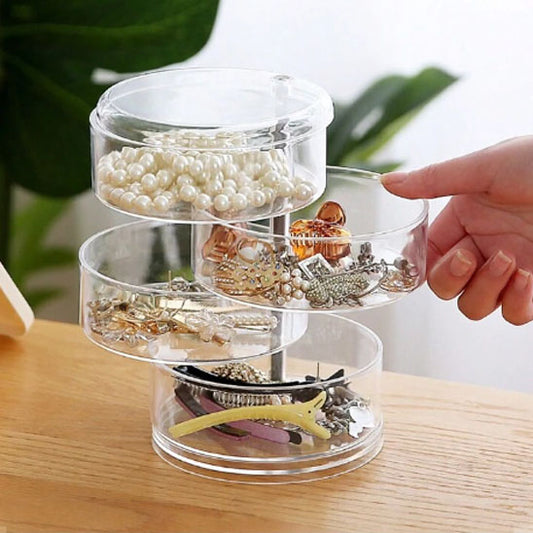 des bijoux parfaitement rangés dans la boîte à bijoux rotative